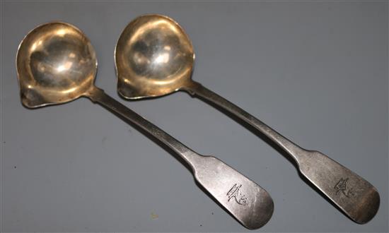 A pair of George IV Irish silver fiddle pattern sauce ladles, 6in.